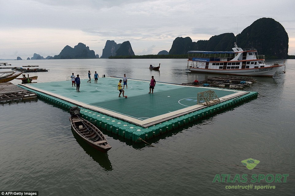 239058B400000578 2852625 Youngsters play football on a floating football pitch in Koh Pan 1 1417169042730