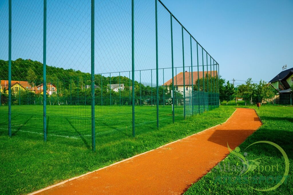 football field next to running track