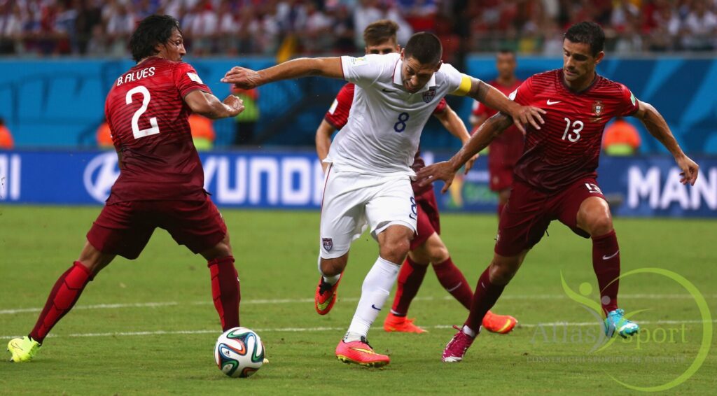 MANAUS, BRAZIL - JUNE 22: Clint Dempsey of the United States is challenged by Bruno Alves (L) and Ricardo Costa of Portugal during the 2014 FIFA World Cup Brazil Group G match between the United States and Portugal at Arena Amazonia on June 22, 2014 in Manaus, Brazil. (Photo by Warren Little/Getty Images)
